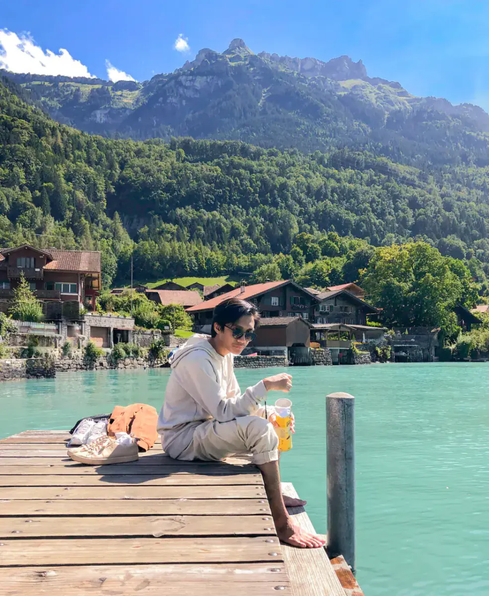 Nabil by a lake in Interlaken, Switzerland